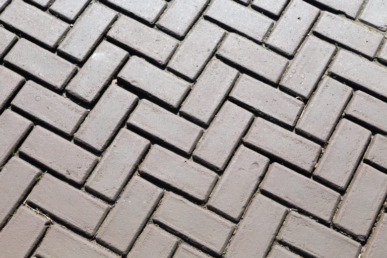 Dark gray brick pavers.